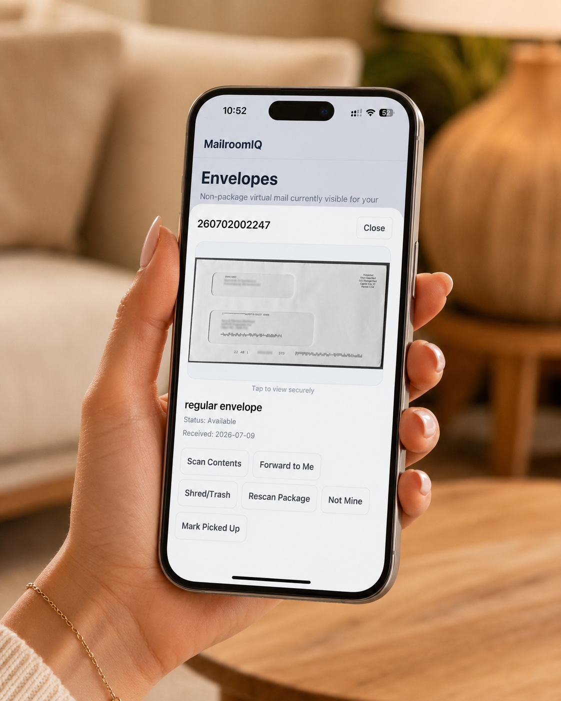 MailroomIQ customer app shown on a phone with secure virtual mail controls.